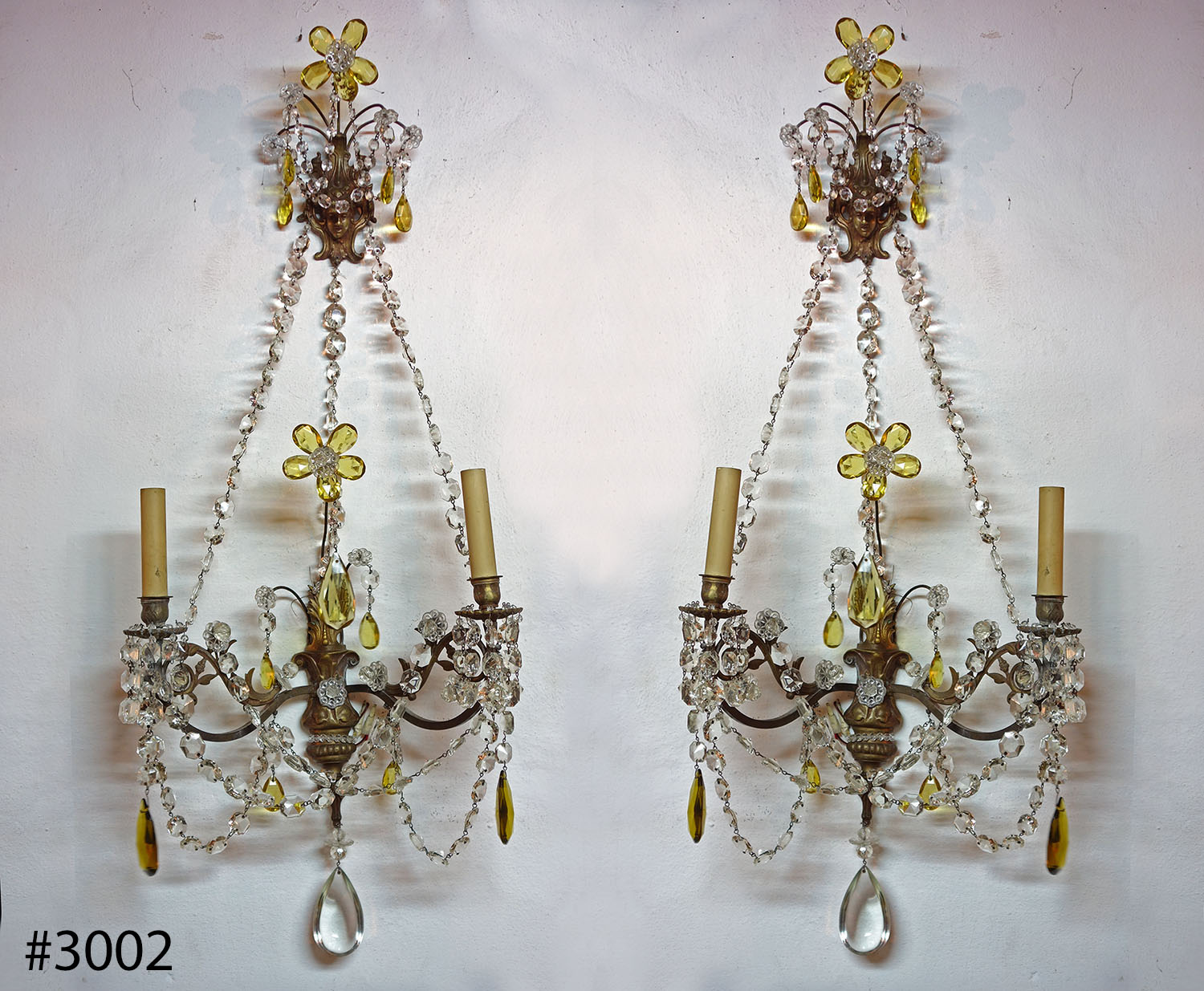A pair of French Maison Jansen cut-glass and gilt-bronze sconces. Ca 1900. (match with lot763)