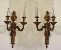 A pair of French Louis XVI style gilt bronze sconces. Ca 1890.