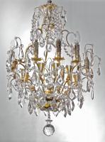 A French Louis XV style cut-glass and gilt-bronze chandelier. Ca 1900.