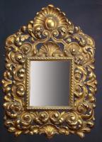 Espejo estilo barroco con marco dorado a la hoja. Ca. 1920.